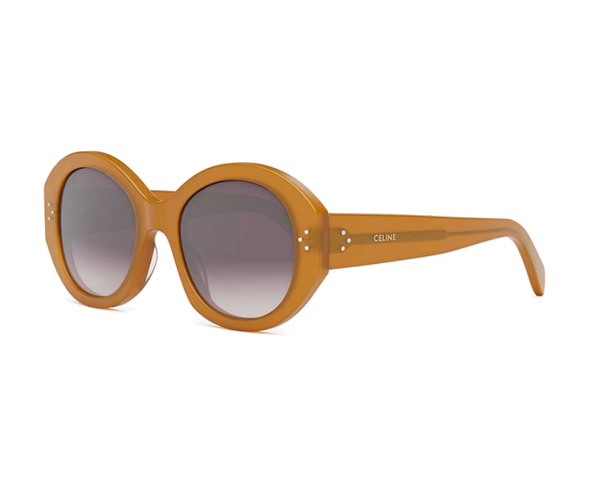 Lunettes de soleil CL40240I de la marque Celine, monture pour femmes, avec un design oversized rond fabriquée en acétate jaune disponible dans les boutiques Atelier Lou Paris