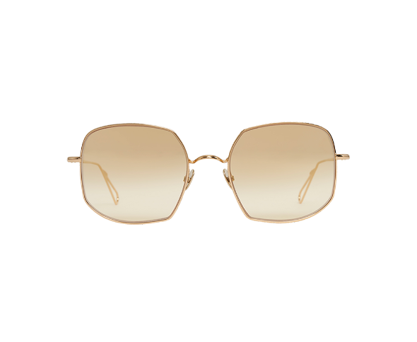 Lunettes de soleil de la marque Ahlem, monture solaire mixte, modèle unisexe champagne qui convient pour les hommes, et les femmes, avec un design hexagonale fabriquée en titane disponible dans les boutiques Atelier Lou Paris 