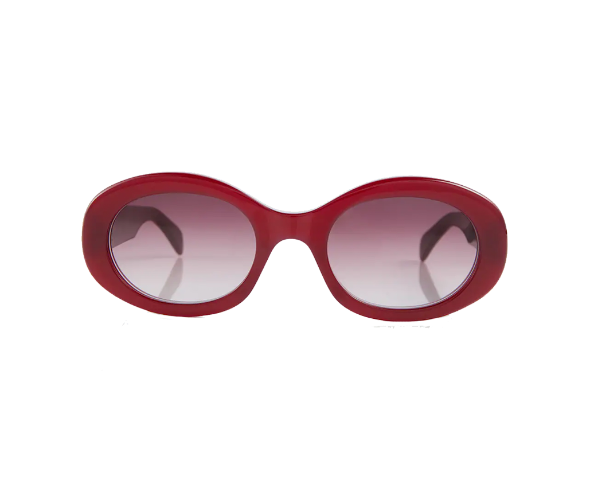 Lunettes de soleil CL40194U de la marque Celine avec le célèbre logo triomphe, modèle pour femmes, avec un design ovale fabriquée en acétate bordeaux disponible dans les boutiques Atelier Lou Paris 