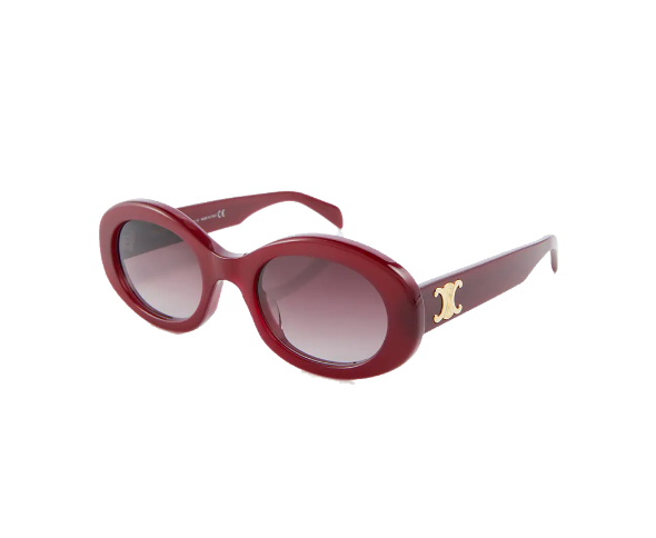 Lunettes de soleil CL40194U de la marque Celine avec le célèbre logo triomphe, modèle pour femmes, avec un design ovale fabriquée en acétate bordeaux disponible dans les boutiques Atelier Lou Paris 